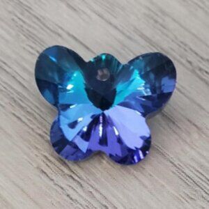 FACETED BLUE TITANIUM CRYSTAL BUTTERFLY PENDANT